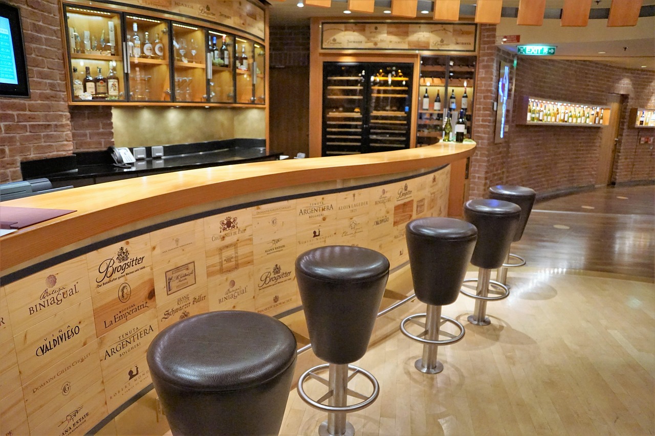 Wine bottles selection in store cellar with premium wine display